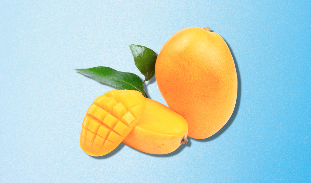 Debunking Myths: Can Dogs Eat Mango? Mango in Blue background